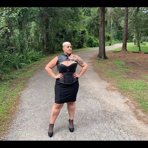 Black leather like corset.